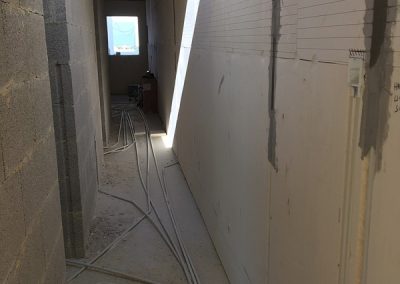 conduit running up the hallway