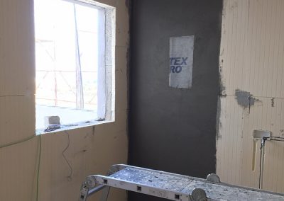 Fibreglass mesh rendered where consumer unit will be