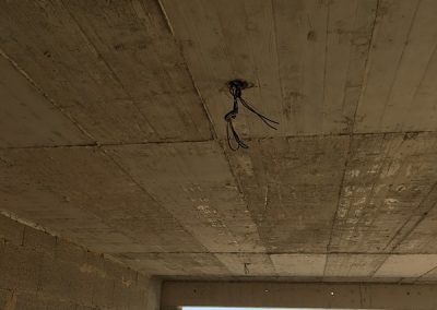 wires hanging out of the ceiling points