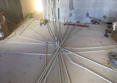 all conduits converge under where the island will be as no underfloor heating in this area