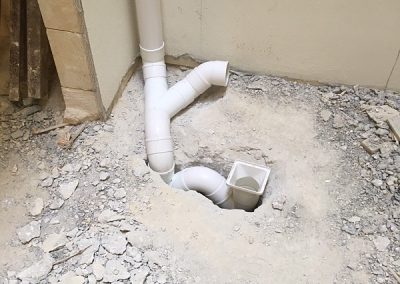 Main waste pipes being installed