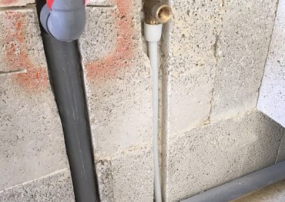 A washing machine tap connection and outlet