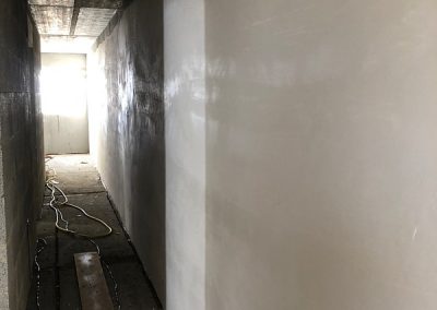 The difference a bit of plaster makes - down the hallway