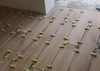 Master bedroom tiles complete to balcony doorway