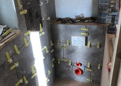 Tiling complete on main bedroom en-suite toilet area