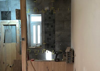 Back wall of main bedroom en-suite complete