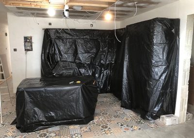 The kitchen now - protected against dust and showing part of the dropped ceiling