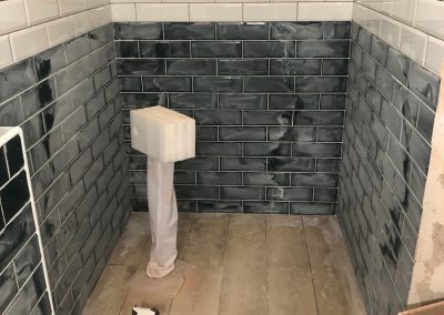 White grouting complete in guest en-suite