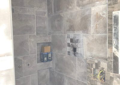White grouting in main bedroom en-suite
