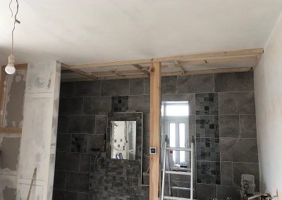 Dropped ceiling frame in master en-suite now built & grouting complete