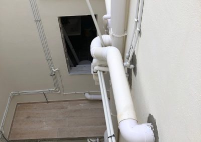 All waste pipes in central shaft now connected and walls rendered