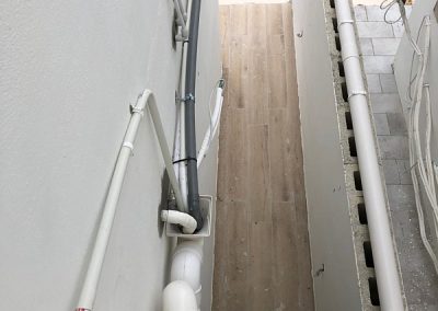 Waste pipes at rear of property connected