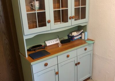 Chimney corner after with refurbished sideboard