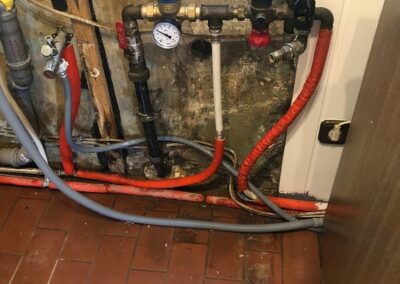 New pressure regulator (blue) installed - water pressure too high